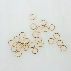 50 st - 14K guldfyllda 4 mm STÄNGDA hoppringar 22ga, Tillverkade i USA, GF16