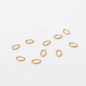 100個入り 14Kゴールドフィルド 3 x 5 mm オープンオーバルジャンプリング 22ゲージ アメリカ製 GF47