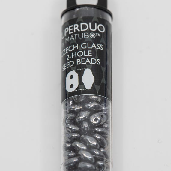 Jet Hematite - SuperDuo, 2.5x5mm 22g Jet Hematite - SuperDuo, 2.5x5mm 22g