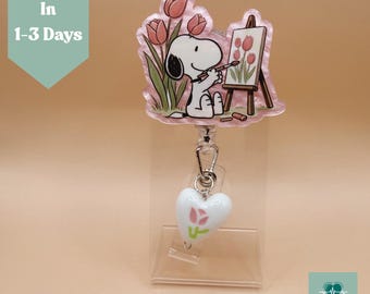 春の花柄スヌーピー絵画バッジリール パステルチューリップ アート愛好家向け 伸縮式クリップ 医療従事者向け ピーナッツファンへのギフトアイデア