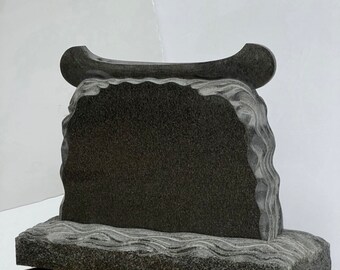 Canoe headstone granite.