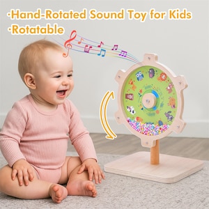 May include: A wooden hand-rotated sound toy for kids. The toy features a colorful design with animal illustrations and a clear window filled with small beads. The text on the image says "Hand-Rotated Sound Toy for Kids" and "Rotatable".