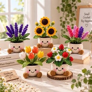 May include: Five crocheted potted plants with smiling faces. The plants include purple lavender, yellow sunflowers, pink and purple hyacinths, multicolored tulips, and red strawberries with white flowers, all in cream-colored pots with small brown feet.