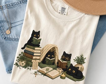 Camiseta de lectura con gato negro, lector acogedor, regalo para bibliófilos de Booktok, camiseta de gato, regalo para amantes de los libros y mamás de gatos, colores cómodos y acogedores estilo cottagecore para amantes de los gatos.