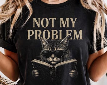 Camiseta divertida de gato, camiseta sarcástica de gato leyendo "No es mi problema", regalo para amantes de los gatos, camiseta para amantes de los libros, camiseta con estampado de gato atrevido, regalo para papás de gatos