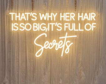 Neon w salonie fryzjerskim: „Dlatego jej włosy są takie duże” Wystrój studia urody