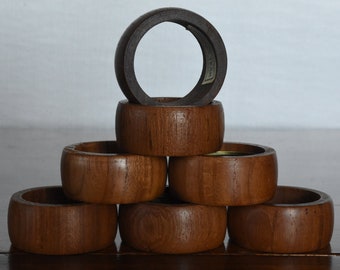 seven vintage round Burma teakwood napkin rings - 1970's - Hong Kong - midcentury modern