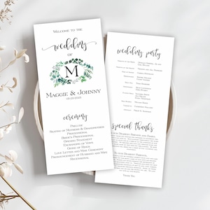 May include: Wedding ceremony program with a green and white floral design. The program includes the names Maggie & Johnny, the date 06-25-2005, and a list of the ceremony events. The wedding party and special thanks are listed on the back.
