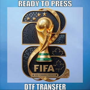 May include: A DTF transfer featuring the number 2026 in a gold-trimmed black design. The FIFA World Cup trophy is centered, with the text READY TO PRESS and DTF TRANSFER at the top and bottom. Includes stars, a maple leaf, and USA | CANADA | MEXICO text.