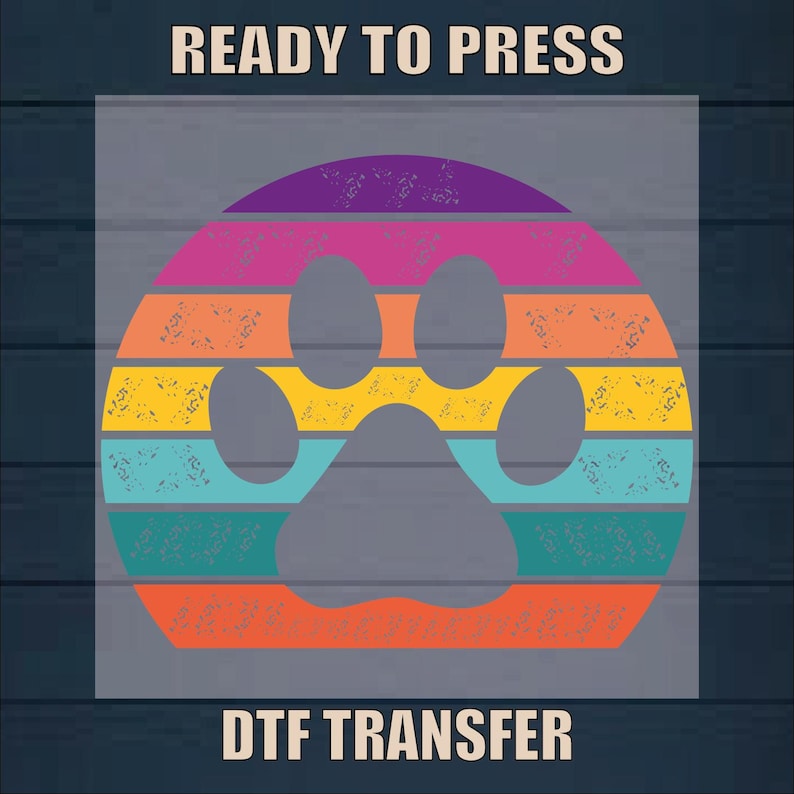 May include: A rainbow-colored paw print design with a distressed vintage look. The design is ready to be pressed onto a t-shirt using a DTF transfer.