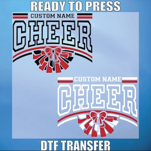 May include: Two cheerleading DTF transfer designs. The word "CHEER" is in bold, outlined letters, with a red and black pom-pom design. The text "CUSTOM NAME" appears above the word "CHEER". The words "READY TO PRESS" and "DTF TRANSFER" are also visible.