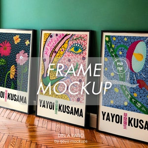 May include: Three framed art prints with black frames and white mats. The prints feature colorful abstract designs by Yayoi Kusama. The prints are hanging on a green wall.