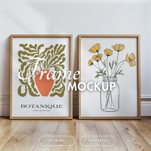May include: Two framed illustrations, one with a green and orange vase with a leafy plant and the text "BOTANIQUE FLORA COLLECTION", the other with a vase of yellow flowers in a mason jar.
