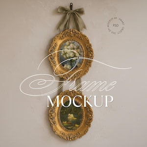 May include: Two oval gold ornate frames hung vertically with a sage green ribbon bow at the top. The top frame displays a white floral arrangement, while the bottom frame shows a duck on water. Text overlay reads Frame MOCKUP and 300 DPI SMART OBJECT.