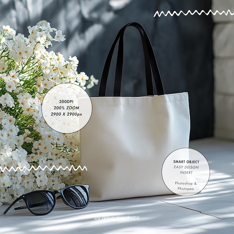 May include: A white tote bag with black handles stands next to a bouquet of white flowers and black sunglasses. The bag is blank, ready for a design. The image includes text that says "300DPI, 200% ZOOM, 2900 X 2900px" and "SMART OBJECT EASY DEISGN INSERT Photoshop & Photopea."