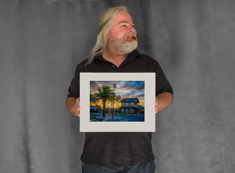Sun Rises Behind the Depot Building - 7-3/8"x9-7/8" Matted Photo Size