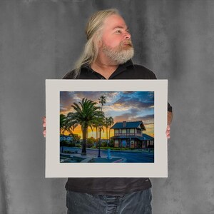 Sun Rises Behind the Depot Building - 11-3/8"x15-1/8" Matted Photo Size