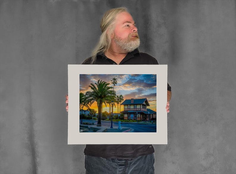 Sun Rises Behind the Depot Building - 11-3/8"x15-1/8" Matted Photo Size