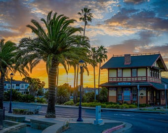Sun Rises Behind the Depot Building — palm tree sunrise
