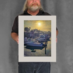 Rising Sun Glows Over Marina - 15-1/8"x11-3/8" Matted Photo Size