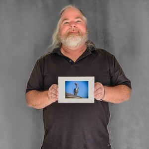 Still Pelican on a Rooftop — pelican photos - 3-1/8"x4-3/8" Matted Photo Size