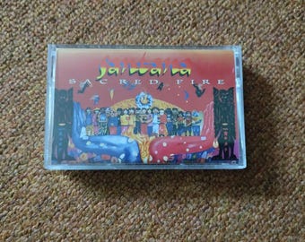 Santana – Sacred Fire (Live In South America) Cassette Tape Latin Pop Rock Jazz Rock Fusion