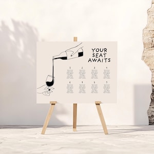 Puede incluir: Un diagrama de asientos blanco con texto negro e ilustraciones. El texto dice "Your Seat Awaits". La ilustración muestra una mano vertiendo vino de una botella en una copa.