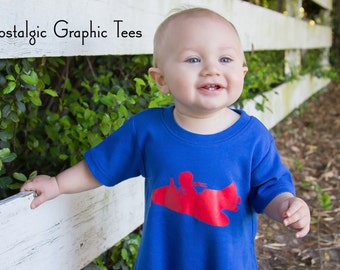 WAREHOUSE SALE Jet Set Short Sleeved Romper by Nostalgic Graphic Tees in Royal with Red