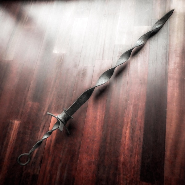 Firelink Greatsword, a forged iron coiled sword inspired by the world of Dark Souls. Handcrafted collector's item.