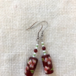 Red and green floral earrings
