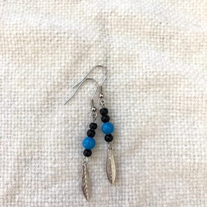 Blue feather earrings