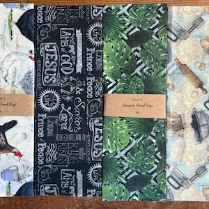 May include: A set of three ceramic mugs with a speckled, matte finish. Each mug features a different color: light blue, cream, and gray. The mugs have a simple, modern design and a comfortable handle. Perfect for coffee or tea.