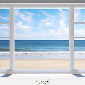 May include: A white window frame looking out onto a sandy beach with blue ocean waves and a bright sky with wispy clouds. The text CURATE YOUR VIBES is printed in black and tan at the bottom center of the white border surrounding the window view.