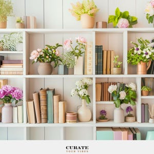May include: A white multi-tiered bookshelf filled with various hardcover books and assorted floral arrangements in ceramic and metallic vases. The bottom center features the text CURATE YOUR VIBES in a clean, black, sans-serif typeface.