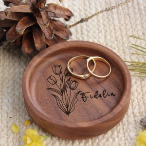 ersonalized Wooden Ring Dish – A Timeless Symbol of Love & Elegance
Mark life’s most precious milestones with a handcrafted wooden ring dish, exquisitely designed to hold your most cherished jewelry. Whether celebrating an engagement, wedding, anniversary, birthday, or a special gift for a loved one, this piece is more than just a ring holder—it’s a keepsake of treasured memories.