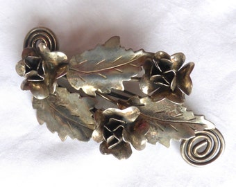 Broche de flores y hojas de ley Raffaele