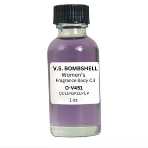 May include: A clear glass bottle with a black cap, filled with a lavender-colored liquid. The label reads "V.S. BOMBSHELL Women's Fragrance Body Oil" and includes the product code "O-V451" and the text "QUEEN2KEEPUP". The bottle contains 1 oz of product.