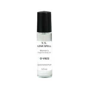 May include: A clear glass roll-on bottle with a black cap. The label reads "V.S. LOVE SPELL Women's Fragrance Body Oil O-V923 QUEEN2KEEPUP 1/3 oz."