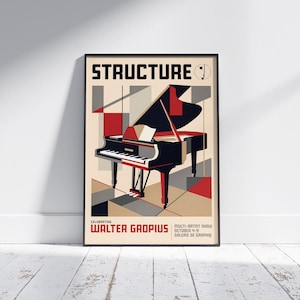 May include: A framed art print featuring a stylized illustration of a grand piano. The artwork uses geometric shapes in red, black, and beige. The word "STRUCTURE" is at the top, with text below that reads "CELEBRATING WALTER GROPIUS".