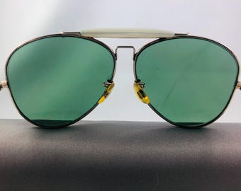 Occhiali da sole vintage Bushnell anni '60