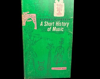 Breve historia de la música de Alfred Einstein. Vintage Books V-4, 1962. Libro de bolsillo.