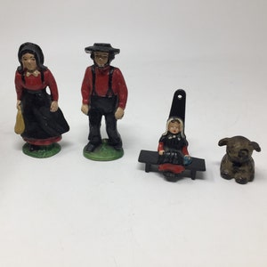 Old Fashioned Cast Iron Amish Family