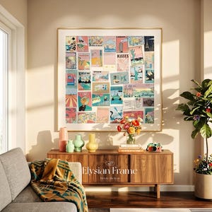 May include: A large framed artwork featuring a collage of vintage travel postcards hangs above a wooden cabinet. The cabinet holds vases, books, and a retro camera. A gray sofa with a patterned throw and a potted plant complete the room's decor.