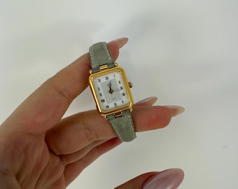Vintage Jazz Paris Quart Watch Gold Pleated With a Green Leather Band