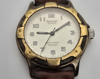 Ricoh Quarz Uhr im Vintage-Stil