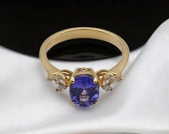 Anillo ovalado de oro con tanzanita y diamantes de 8x6: una pieza única