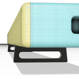 May include: A long, rectangular speaker with a light blue and yellow finish. The speaker has a black stand with two legs.