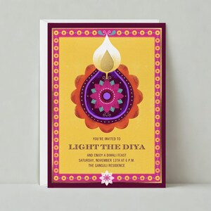 May include: A Diwali invitation card with a yellow background and a decorative border. The card features a stylized diya (lamp) design in orange, purple, and gold. Text on the card reads "You're invited to Light the Diya and enjoy a Diwali feast."