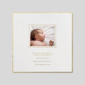 May include: A white card with gold trim and a photo of a baby in a white blanket. The text on the card reads "lila and john ames invite you to the christening of their son robert john sunday, november 4th at 10 am first congregational church"