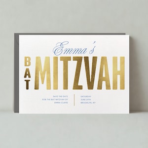 May include: Gold foil save the date card with the text "Emma's Bat Mitzvah" and the date "Saturday, June 29th, Brooklyn, NY".